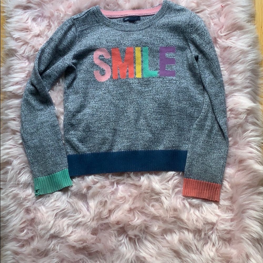 Gap kids sweater with Smile in the middle.